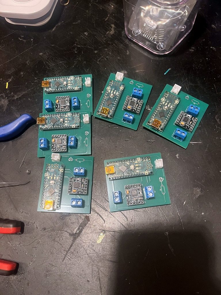 Six V2 circuit boards with Nanos and drivers mounted